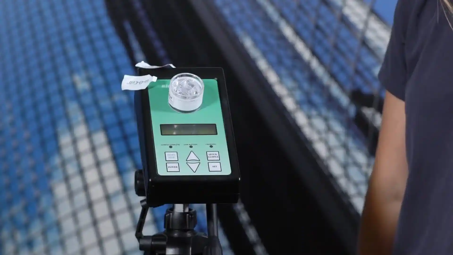 Air sampling pump on a tripod used for mold spore testing